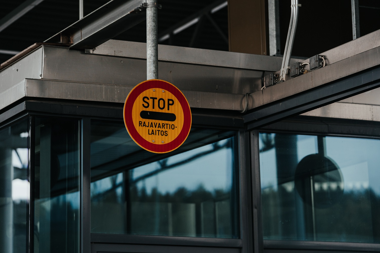 Stop sign at border crossing point.