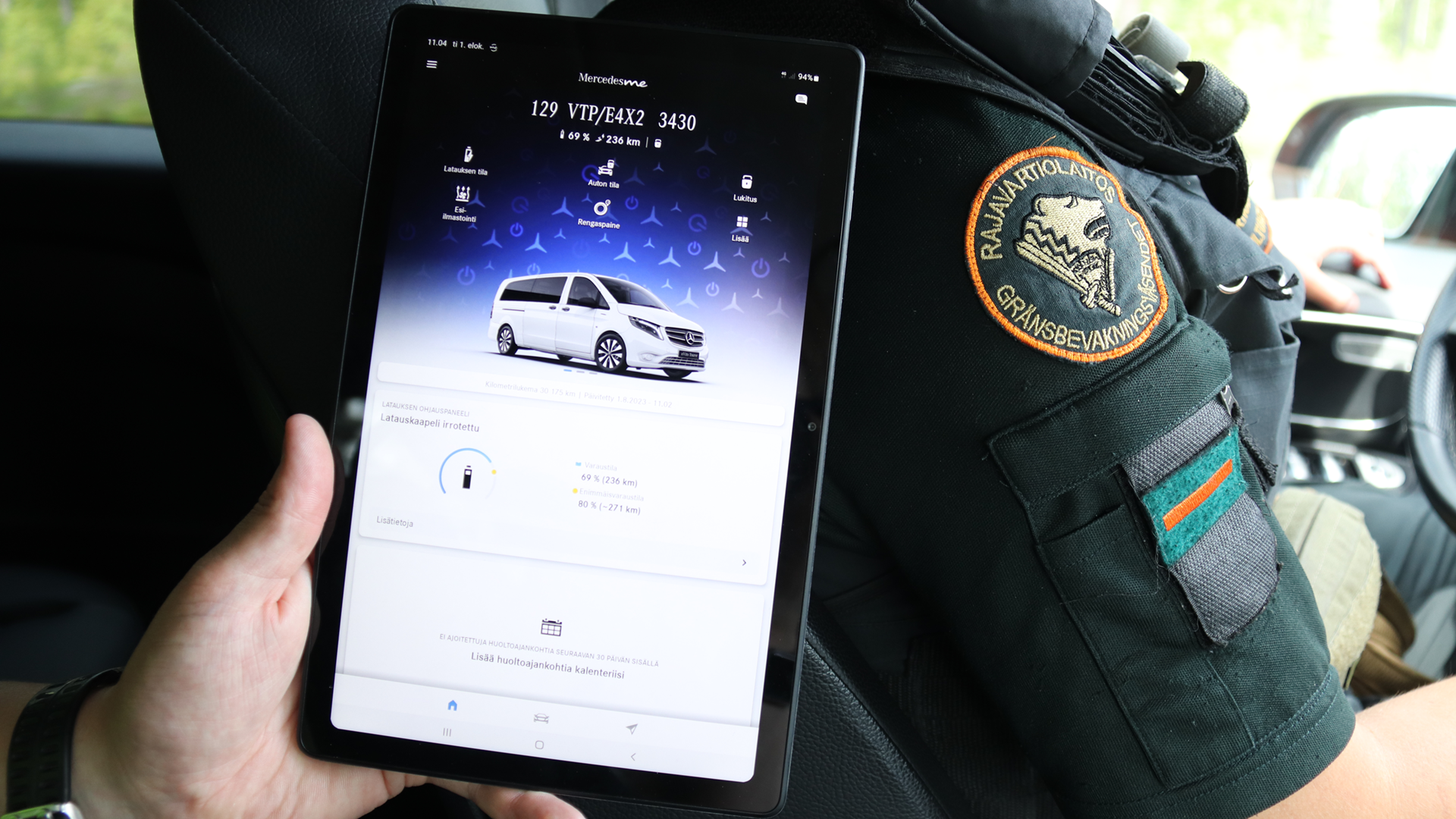 The charging view of the Border Guard’s electric car on iPad screen. The picture is taken inside the car when the car is moving.