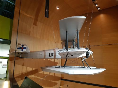 A biplane on display at the museum.
