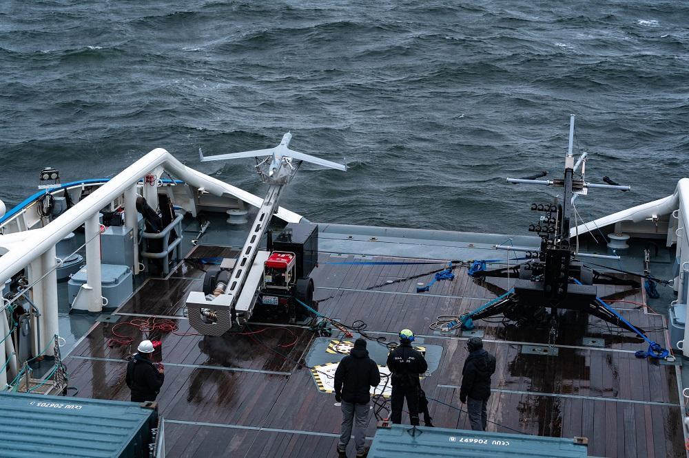 Unmanned aircraft ready to launch at the deck of a vessel.